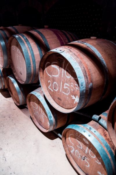 Brown wooden barrel lot. 