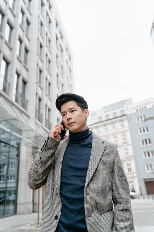 A man in a gray coat