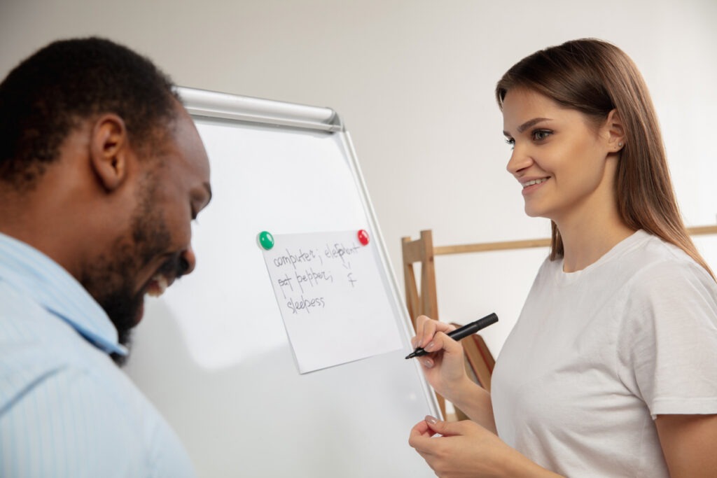 A student answering question by her Professor