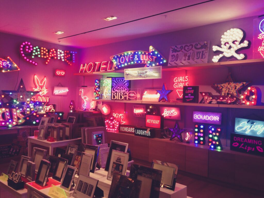 a store that features neon signs and lights