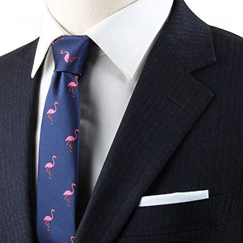 a mannequin wearing a black suit and a blue tie with flamingos printed all over it