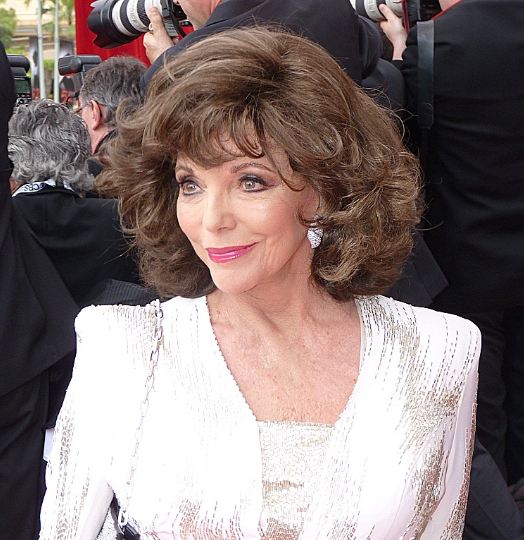 Joan Collins, a famous star that was a key influencer of the 80s fashion.