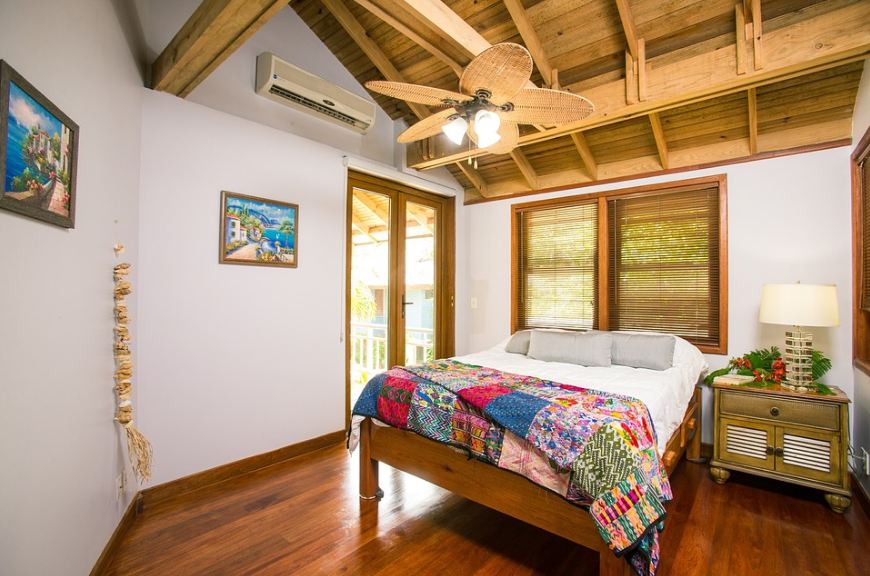 a bedroom with an island-themed décor