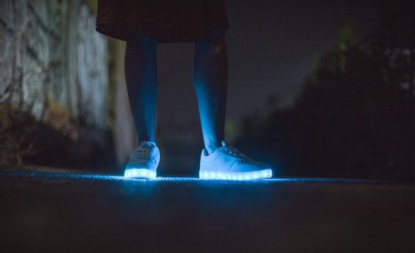 person wearing an LED light-up shoes