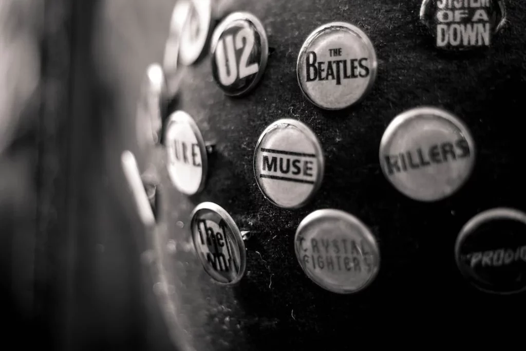 Different button pins of famous bands
